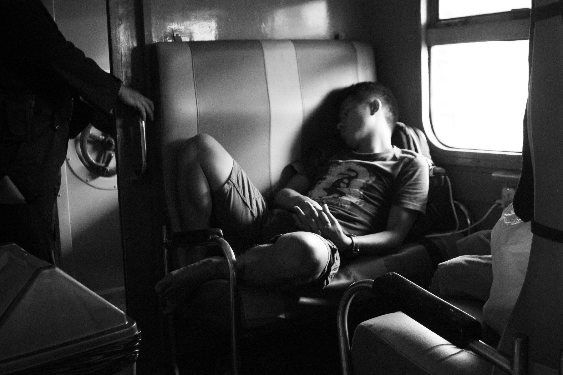 A man sleeping in the train